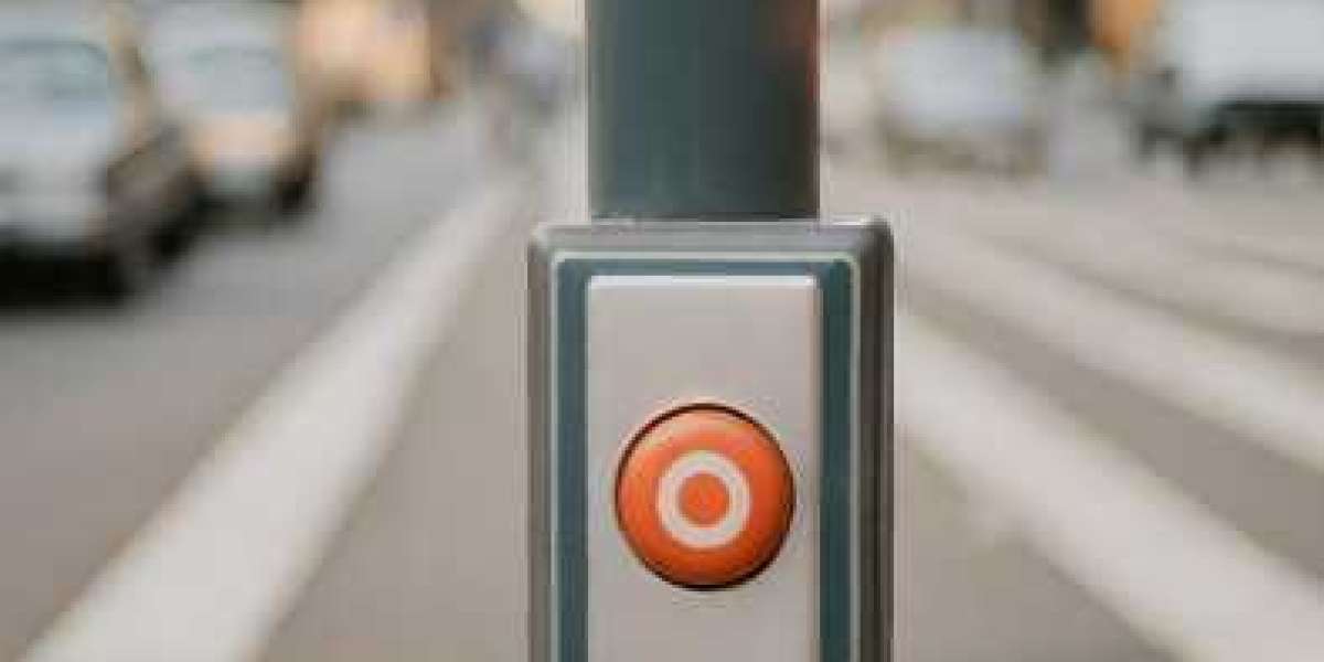 The Role and Evolution of Pedestrian Push Buttons in Urban Crosswalks